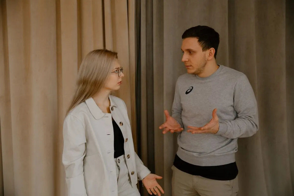 Couple in a gentle, open discussion at home