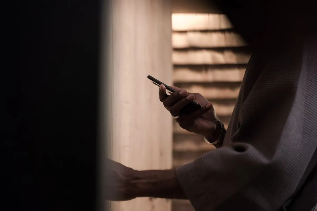 Hands holding a smartphone