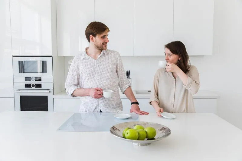 Couple sharing a quiet moment together over coffee — spontaneous desire changes in long-term relationships