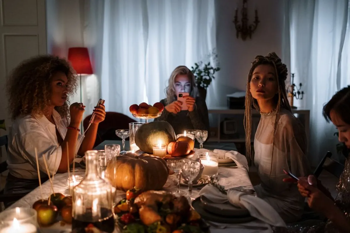 Smartphones resting on a table in a warm home setting