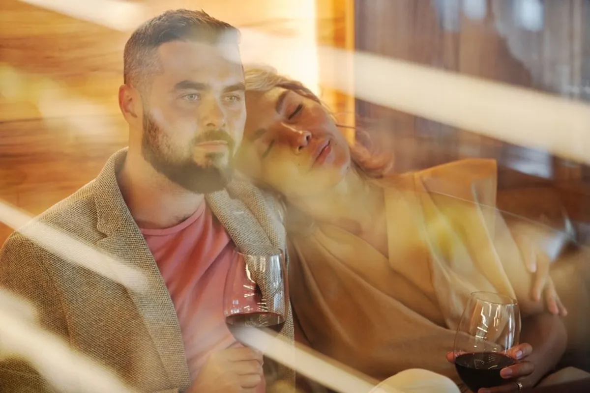 Couple in a quiet, close conversation in the evening