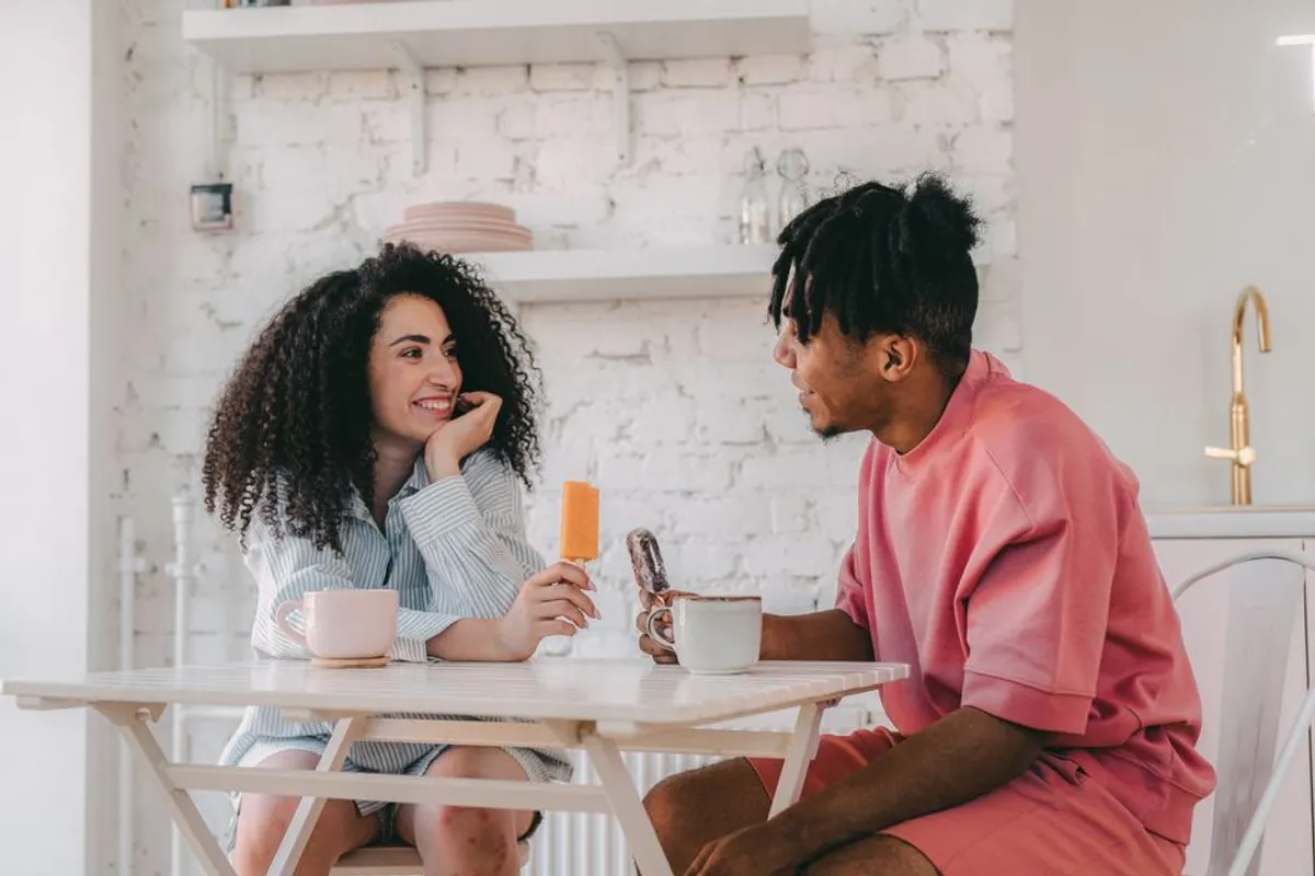 Couple in a curious, gentle conversation close together