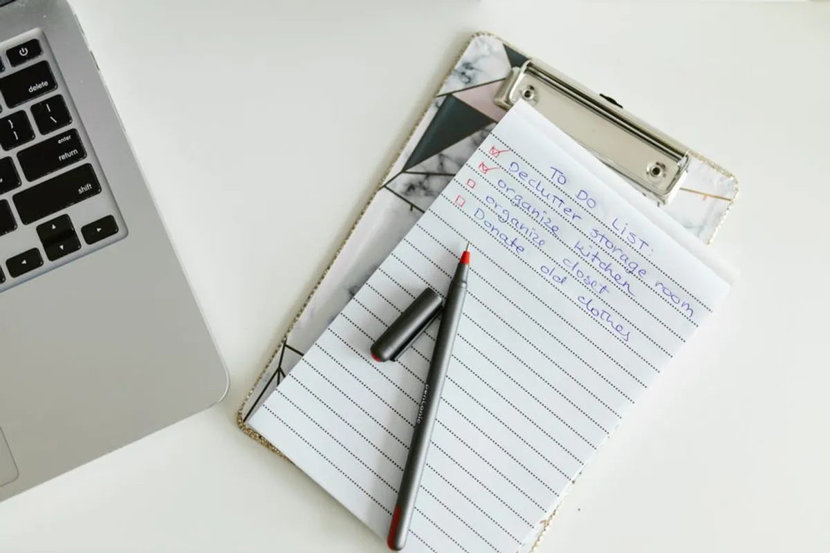Paper checklist and pen on a desk