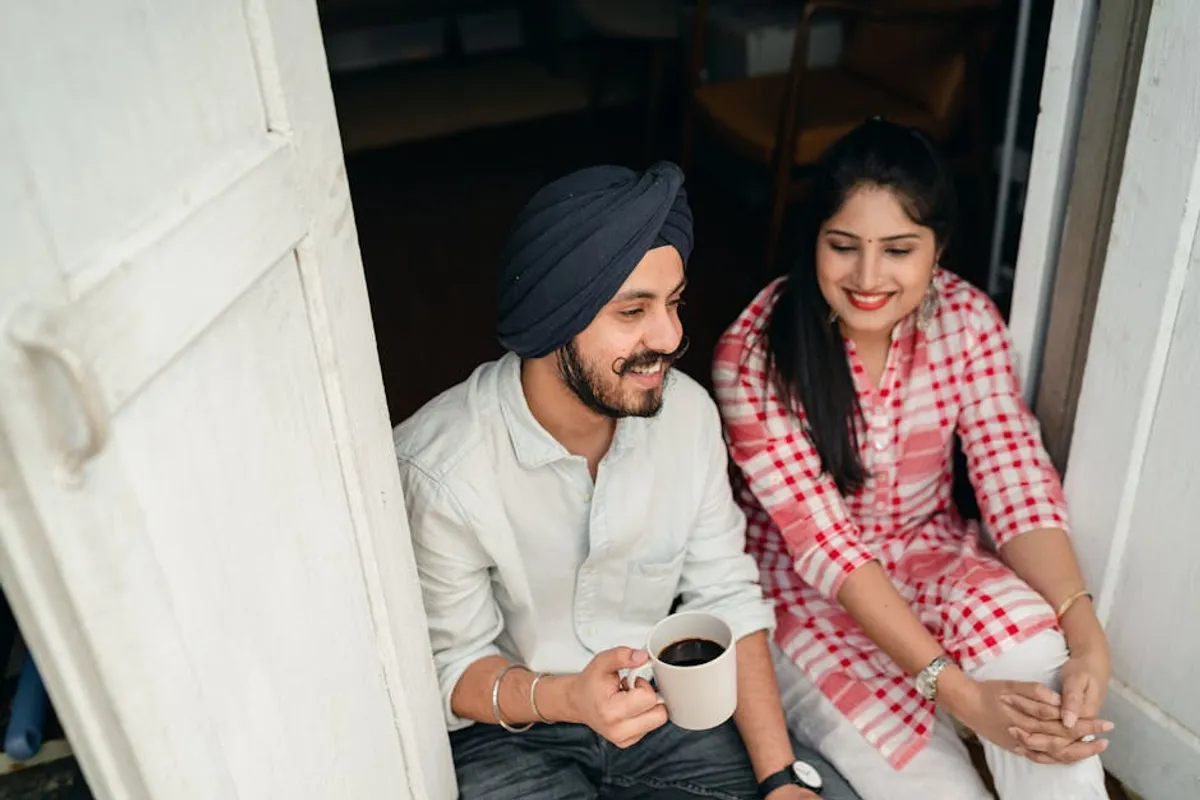 Couple laughing and relaxed together at home