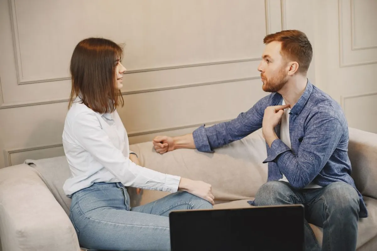 Couple in a warm conversation at home