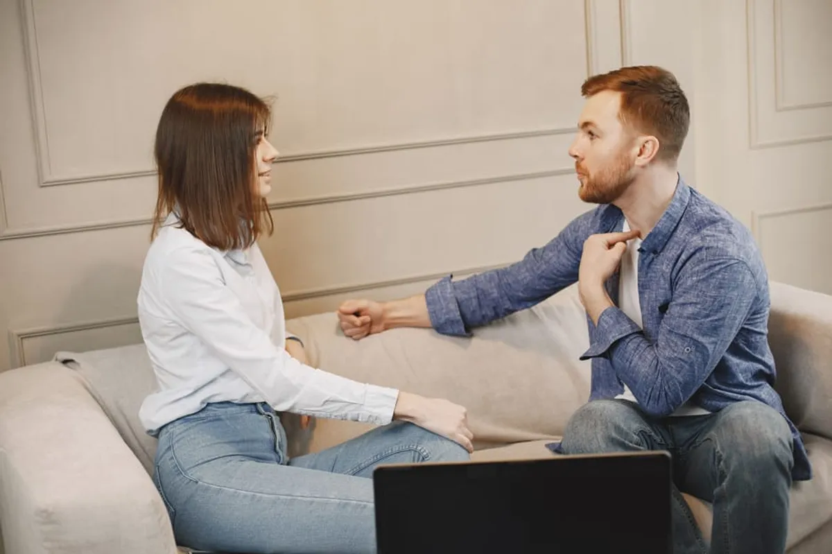 Couple in a warm conversation at home