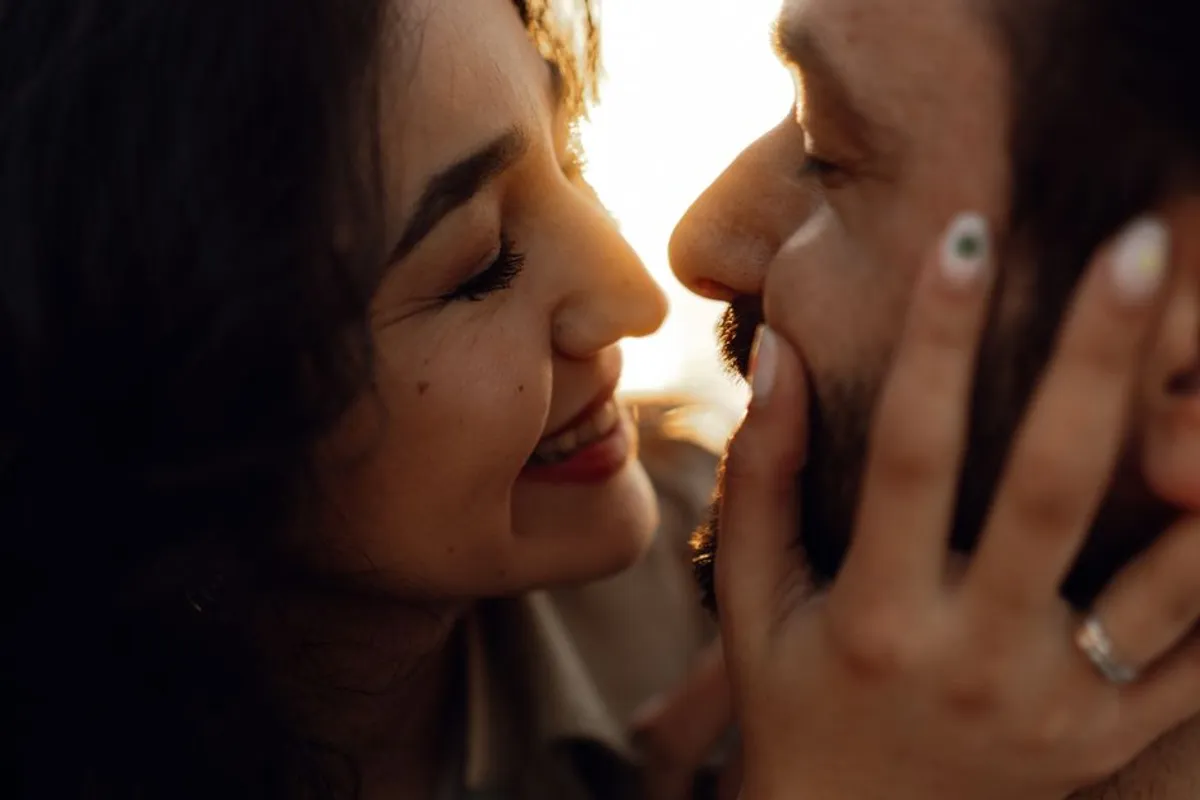 Couple smiling and close together