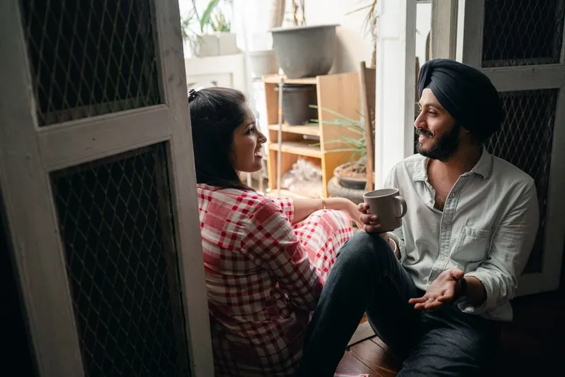 Couple in a calm, open conversation at home